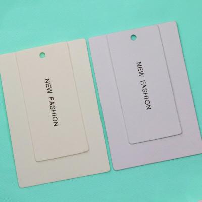 etiqueta de ropa de papel personalizada con cordón
