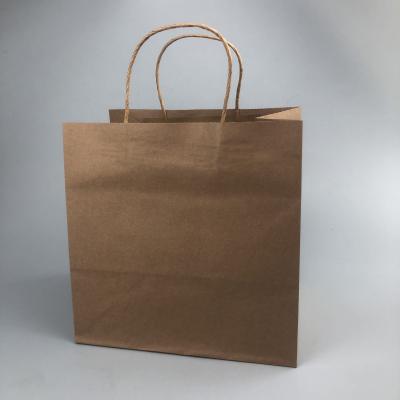 Logotipo personalizado 100% bolsas de papel Kraft reciclables con asas giratorias